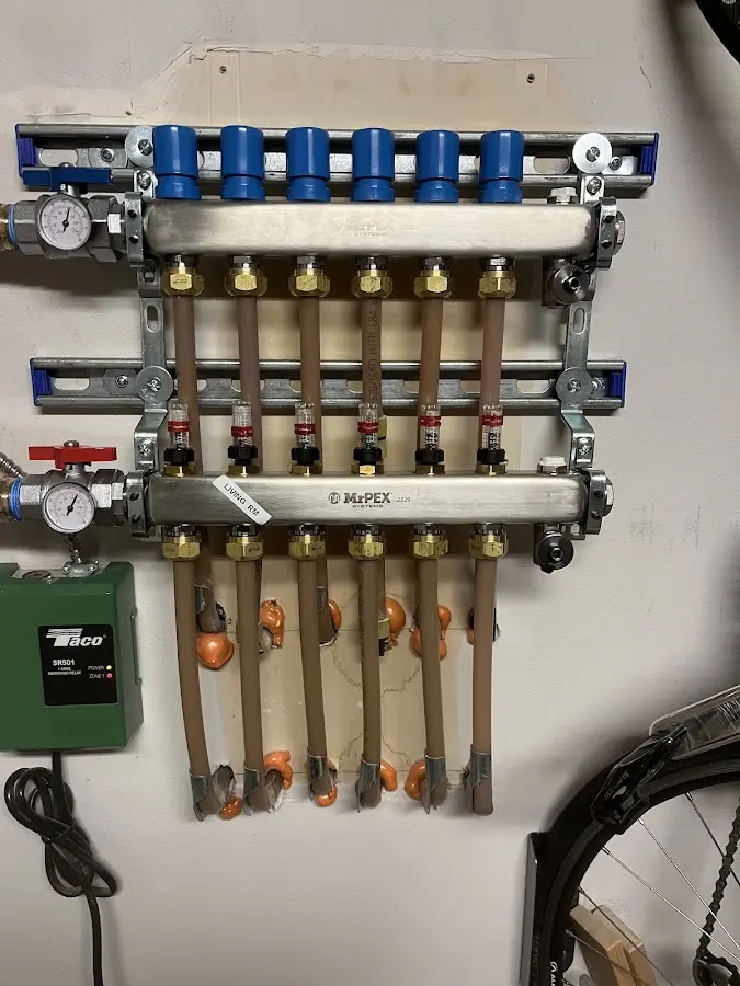 Plumber performing Gas Line Installation at a residential property in Colonie